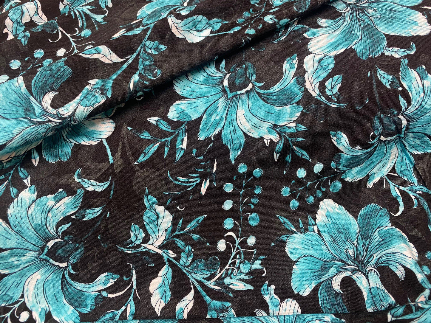 Viskose-Jersey Lilien Türkis Schwarz