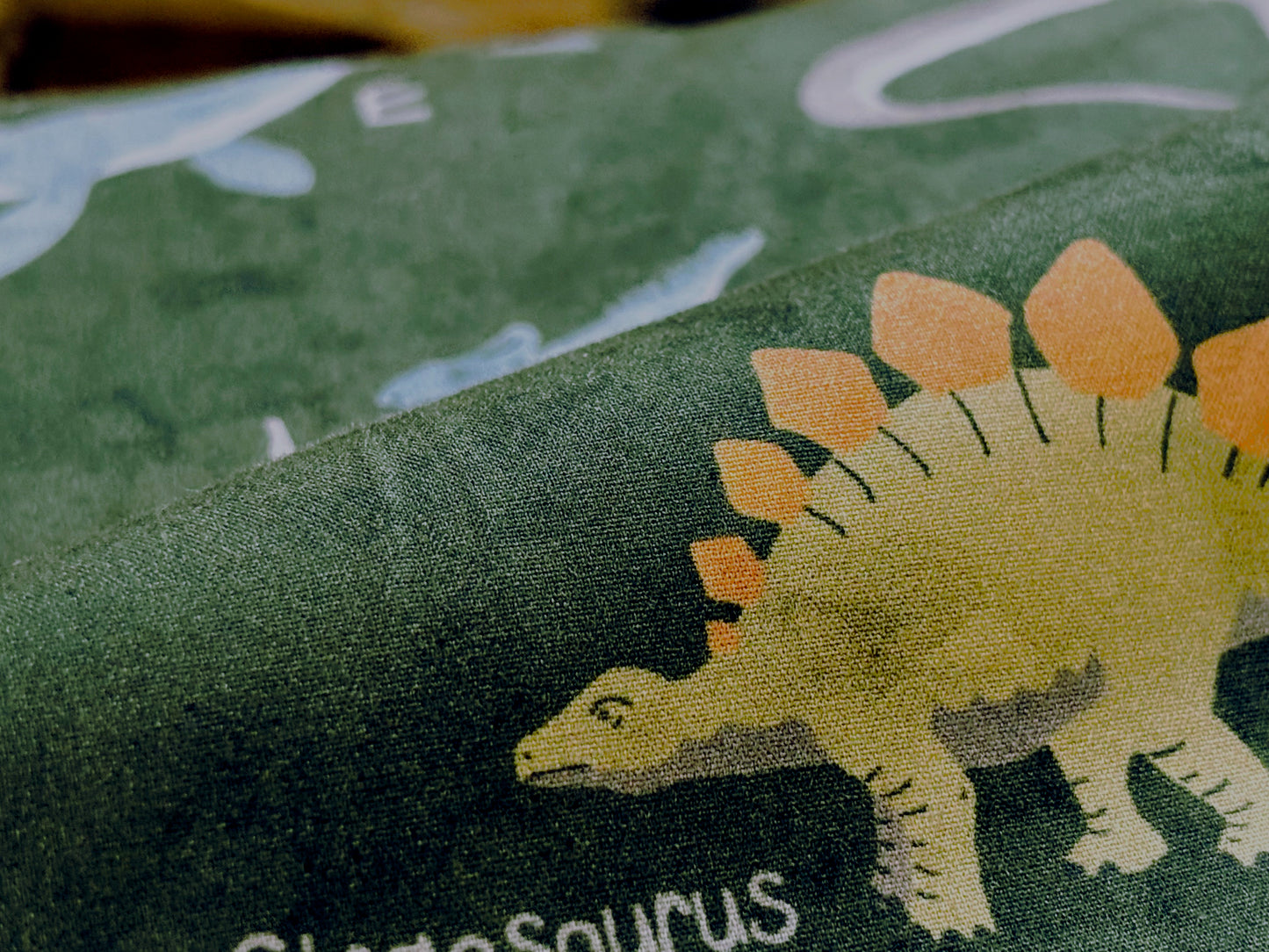 Kinderstoff Dinosaurier Dunkelgrün