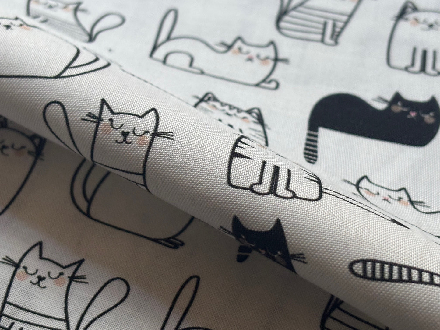 Baumwollstoff Katzen Schwarz auf Weiß