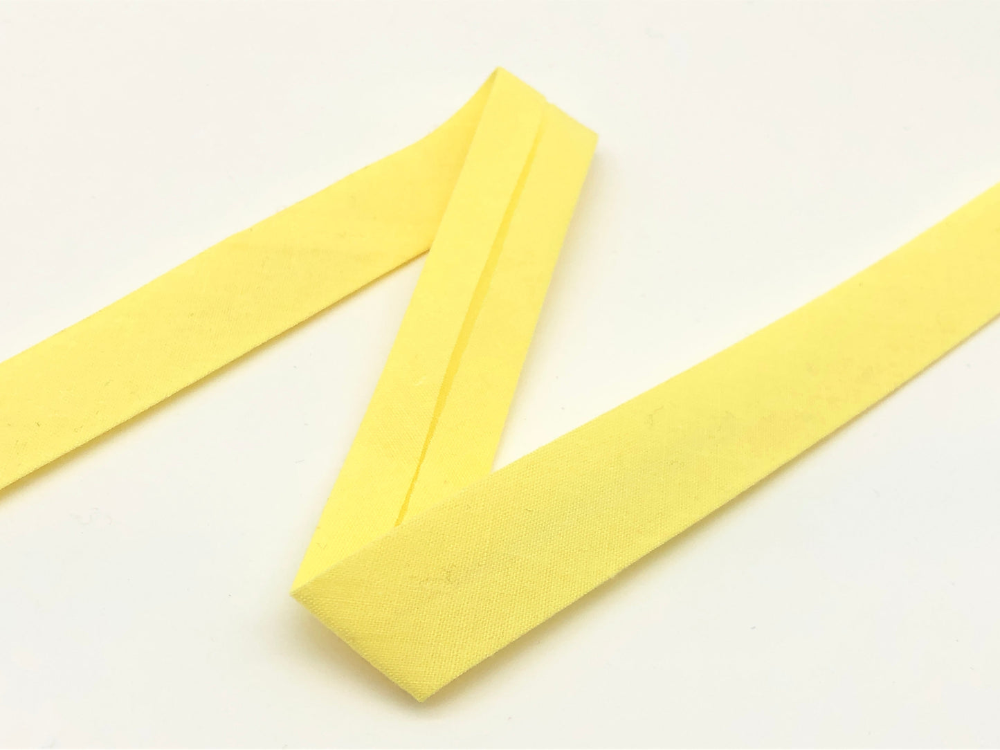 Schrägband 27 mm Pastellgelb 79