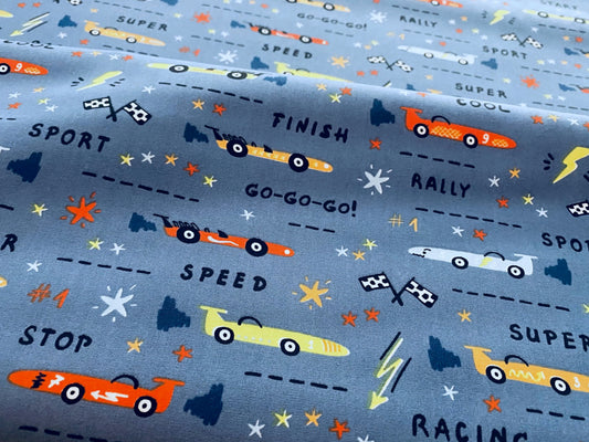Kinderstoff Bunte Autos auf Blau Go