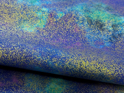 Baumwollstoff Gold Glitzerstaub Türkis Violett wolkig
