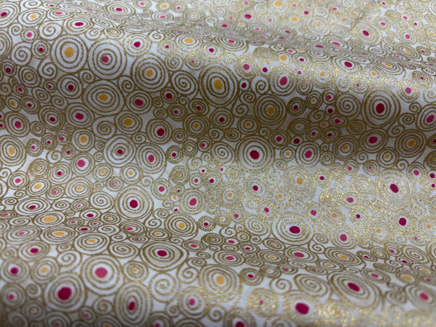 Baumwollstoff Goldkringel