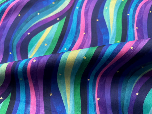 Baumwollstoff Northern Lights Wellen und Sterne