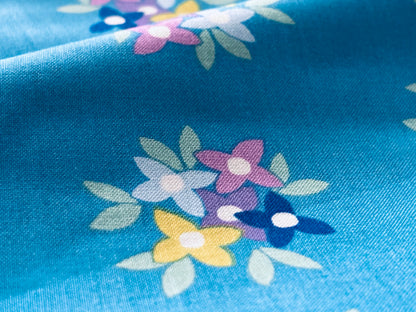 Baumwollstoff Retro Blumen Türkis