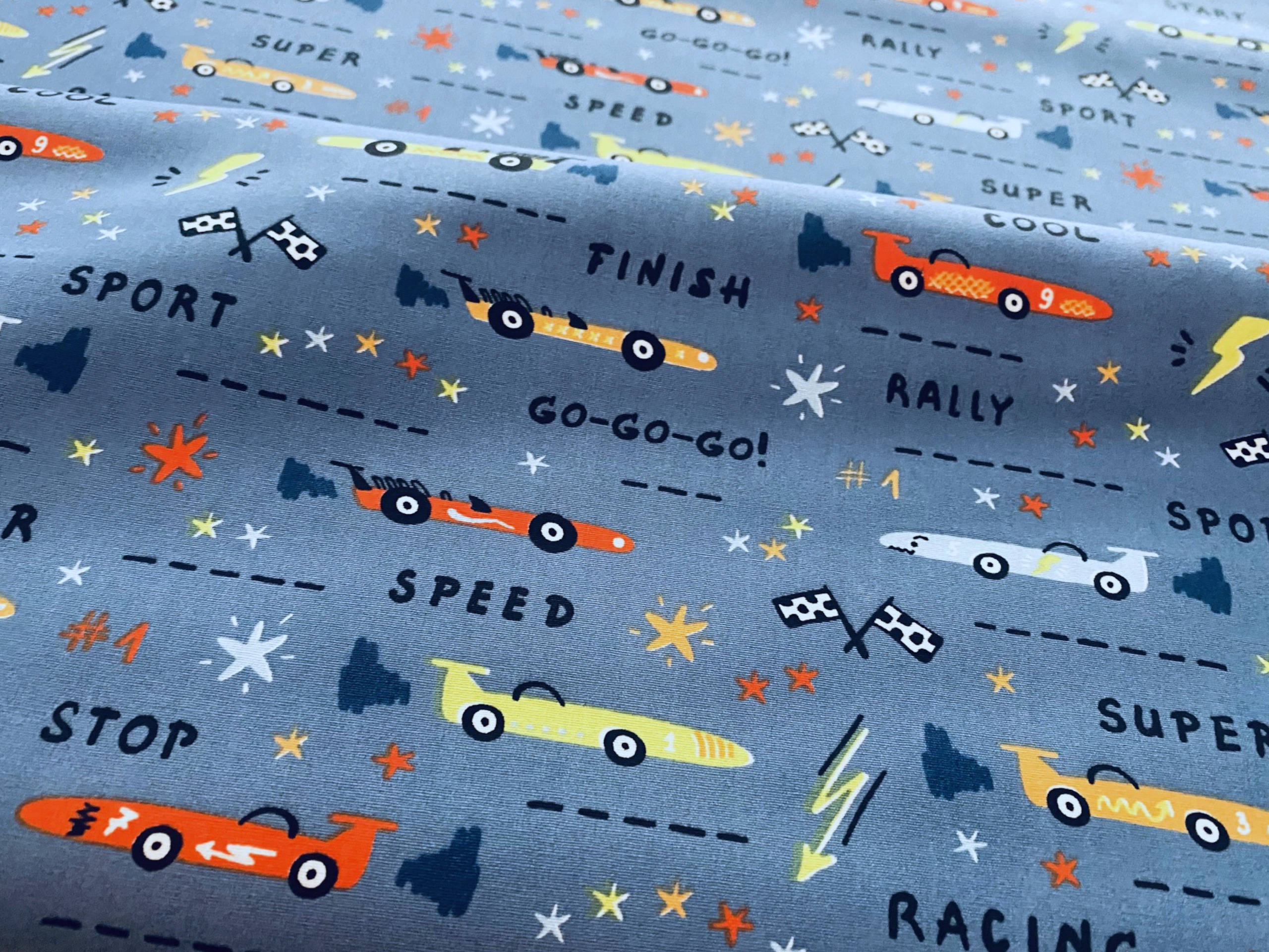 Kinderstoff Bunte Autos auf Blau Go Go Go by Poppy